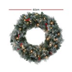 60cm lit Christmas wreath with red berries.