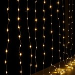 Warm white string lights in darkness.