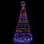 Colourful LED Christmas tree lights in the dark.