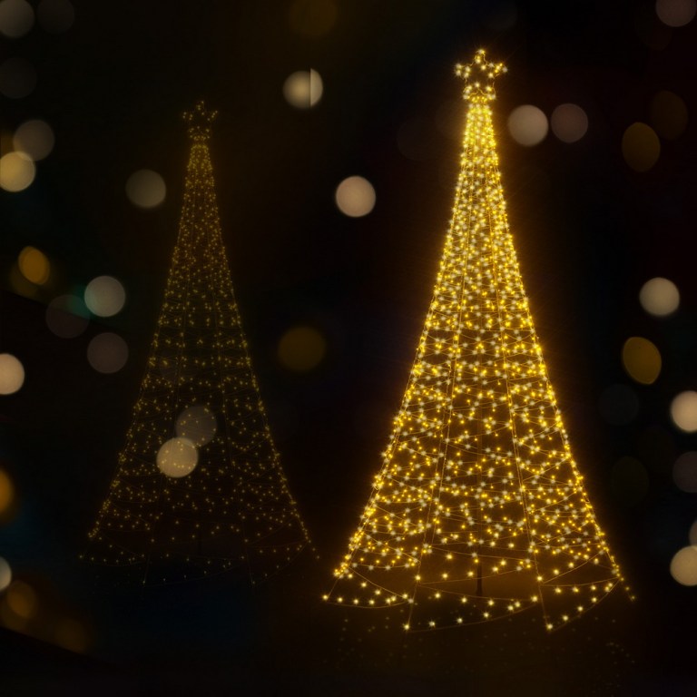 Illuminated Christmas trees with glowing fairy lights.