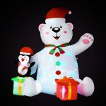Inflatable Christmas bear and penguin decoration with presents.