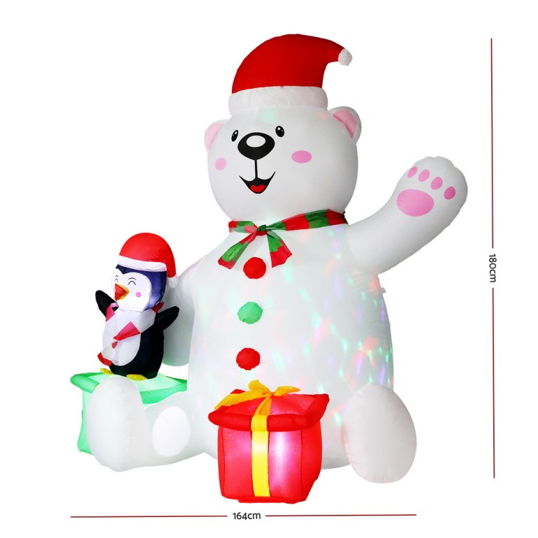 Inflatable Santa bear and penguin with Christmas presents.