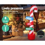 Inflatable candy cane with LED lights and signs.
