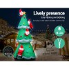 Inflatable Christmas tree with Santa and LED lights.