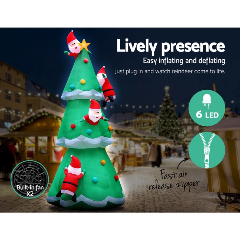 Inflatable Christmas tree with Santa and LED lights.