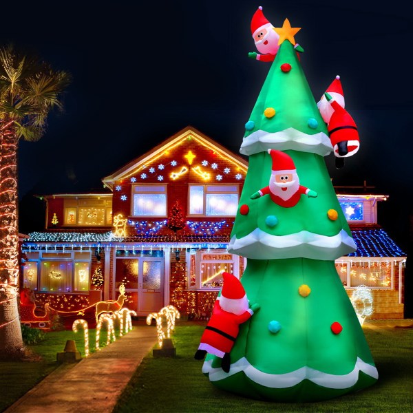 Festive house with inflatable Santa Christmas tree.