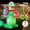 Inflatable dinosaur with Christmas lights and gift box.
