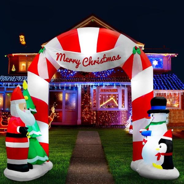 jingle jollys christmas inflatable archwary santa 3m illuminated decorations Festive Christmas decorations with inflatable Santa and snowman.