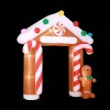 xmas inf ginger arch 10ft 190827 00.jpg Inflatable gingerbread house with candy canes and gingerbread man.