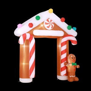 Inflatable gingerbread house with candy canes and gingerbread man.