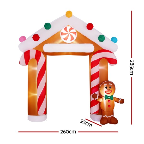 jingle jollys christmas inflatable archwary ginger 2.8m illuminated decorations Inflatable gingerbread archway with candy cane columns.