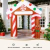 jingle jollys christmas inflatable archwary ginger 2.8m illuminated decorations Inflatable gingerbread house with candy canes, Christmas decor.