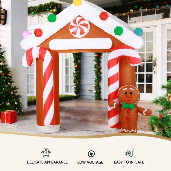 jingle jollys christmas inflatable archwary ginger 2.8m illuminated decorations Inflatable gingerbread house with candy canes, Christmas decor.