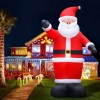 jingle jollys christmas inflatable santa 5m illuminated decorations Giant Santa inflatable with Christmas lights display.