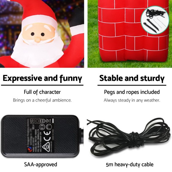 Inflatable Santa with stable base and accessories.