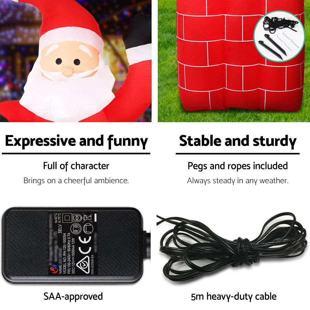 Inflatable Santa with stable base and accessories.