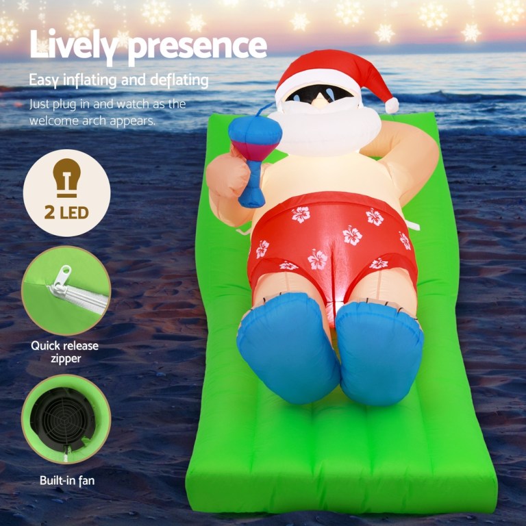 Inflatable beach Santa with drink, LED lights included.