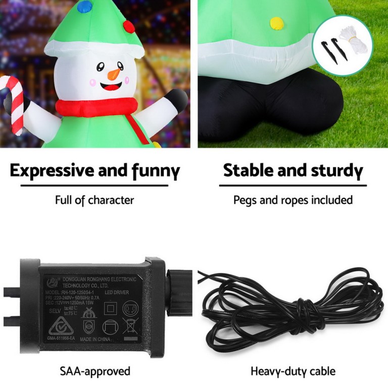 Inflatable Christmas snowman with pegs, rope, and adapter.