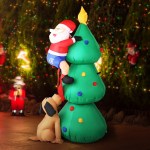 Inflatable Santa and dog climbing Christmas tree decoration.