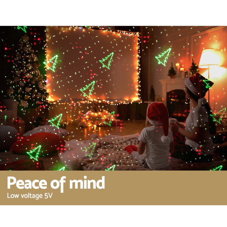 Christmas lights projecting trees on living room wall