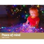 20m christmas lights icicle light 800 led multi coloured jingle jollys Child playing with safe colourful Christmas lights.