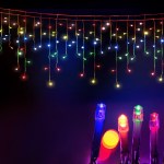 20m christmas lights icicle light 800 led multi coloured jingle jollys Colourful LED fairy lights on dark background.
