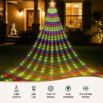 Colourful Christmas tree lights on house lawn.