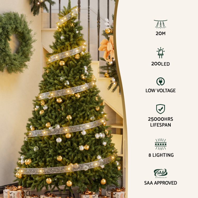 Decorated Christmas tree with LED lights and ornaments.