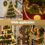 Christmas lights and decorations on tree and fireplace.