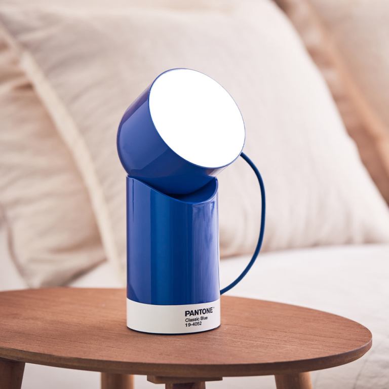 lexon orbe portable led lamp with moving head pantone classic blue
