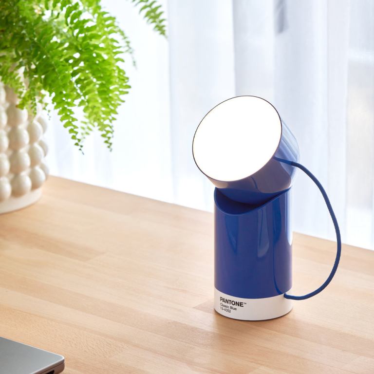 lexon orbe portable led lamp with moving head pantone classic blue