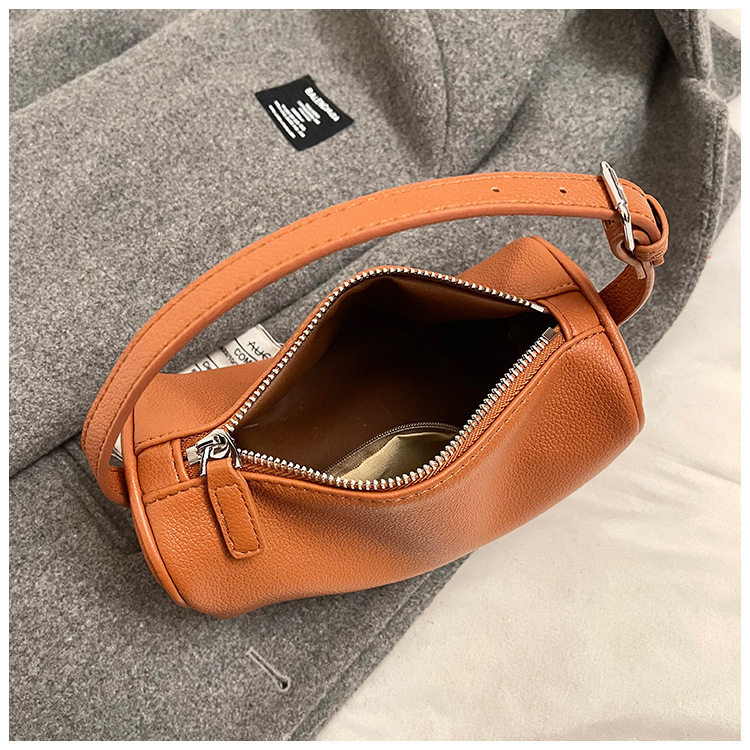 beige minimalist shoulder bag high end cylindrical design