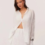 bornlads 2026 spring summer new shirt skirt set ruffled texture sheer shirt mini skirt vacation lazy style two piece outfit Bornlads 2026 Spring Summer New Shirt Skirt Set Ruffled Texture Sheer Shirt Mini Skirt Vacation Lazy Style Two Piece Outfit