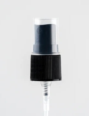Black plastic spray bottle nozzle close-up.