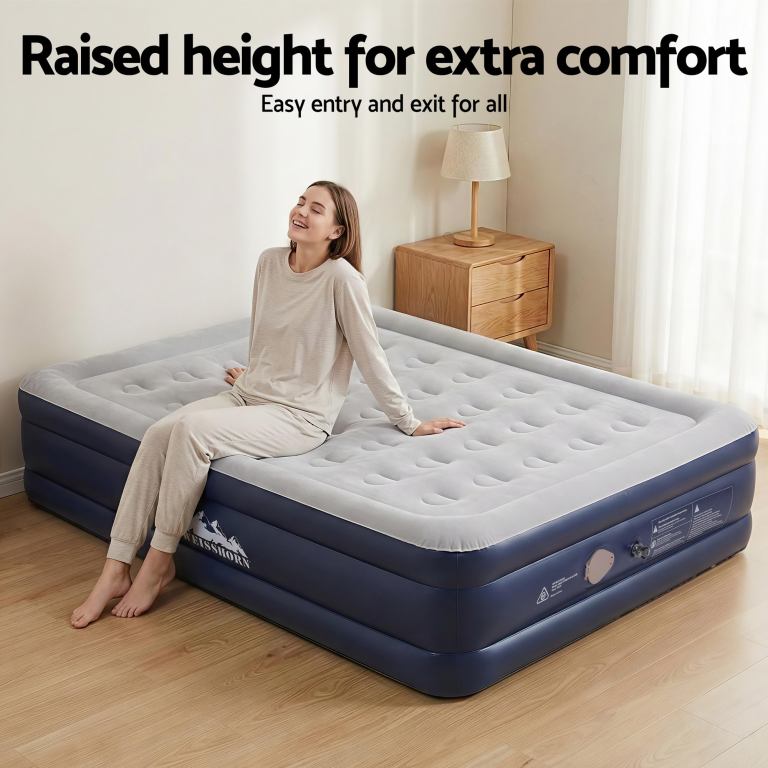 weisshorn air mattress queen inflatable bed 46cm air bed cube Woman sitting on raised air mattress, smiling.