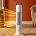 Tower heater emitting warm air in cosy room.