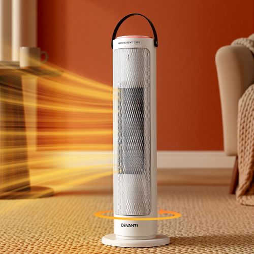 Tower heater emitting warm air in cosy room.