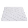 Bamboo fibre mattress topper with green pattern.