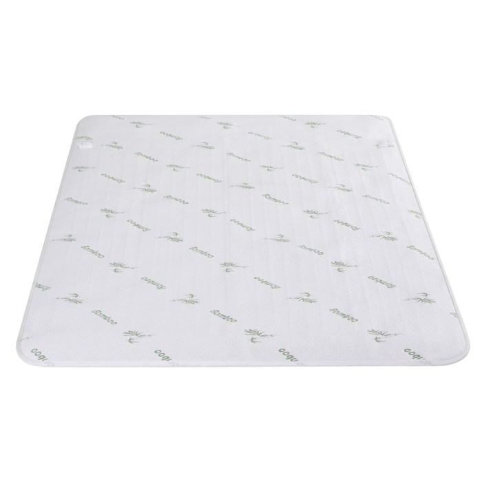 Bamboo fibre mattress topper with green pattern.