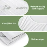 Bamboo fabric mattress protector with fitted skirt.