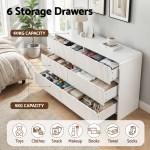 White dresser with six organised storage drawers.