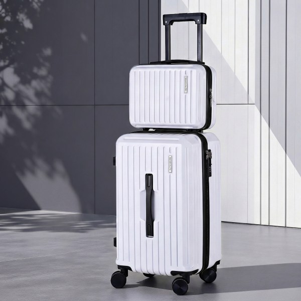 Two stacked white suitcases with wheels and handles.
