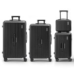 wanderlite 4pcs trunk luggage suitcase set travel carry on tsa lock black Three black suitcases, different sizes, with wheels.