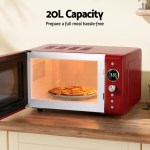 Red microwave oven with pizza inside, 20L capacity.