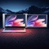 Laptop with dual screens and floral display.