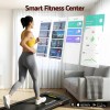 Woman using treadmill with virtual fitness apps displayed.