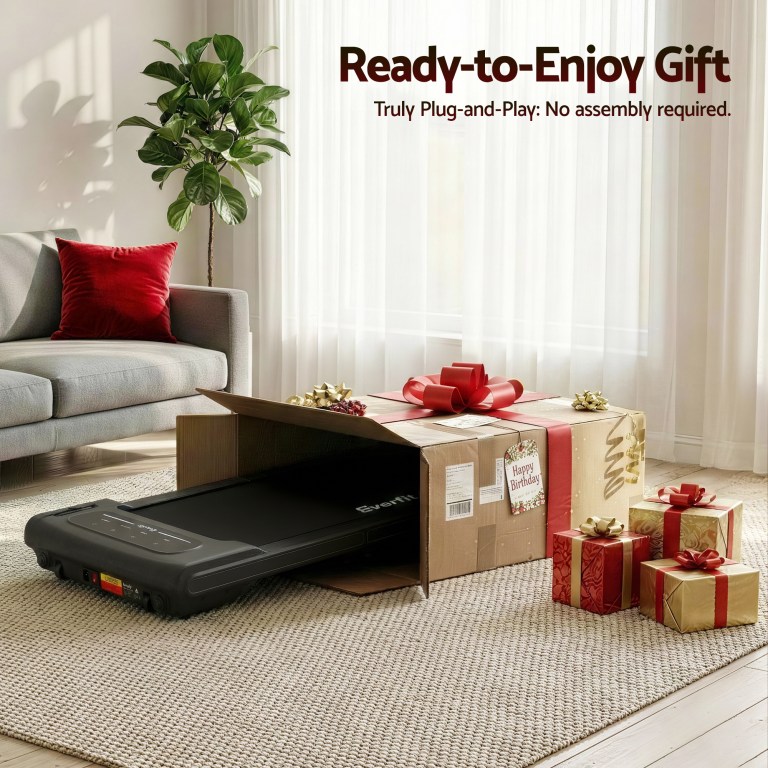 Treadmill in gift box with birthday decorations.