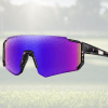 Purple sunglasses on green grass background