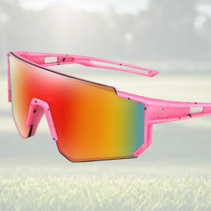 Bright pink sunglasses with gradient lenses outdoors.