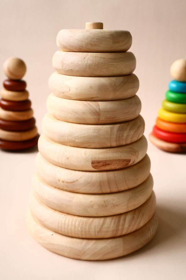 v59 624 202602031611 00.jpg Wooden stacking toys on beige background.